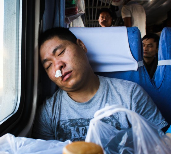 Passager au nez qui coule train Urumqi - Xi'an